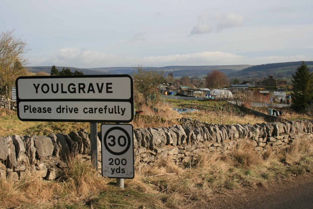 Boundary road sign for the village of 'Youlgrave'
