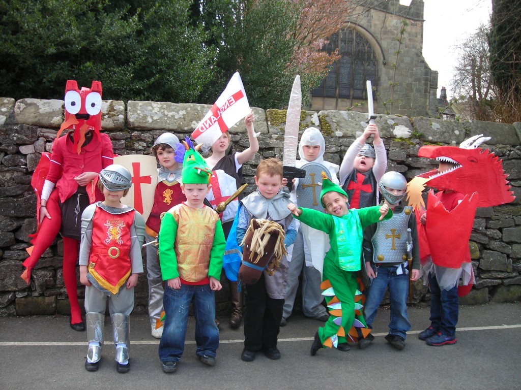 A group of primary school children dressed up as Saint Georges or Dragons